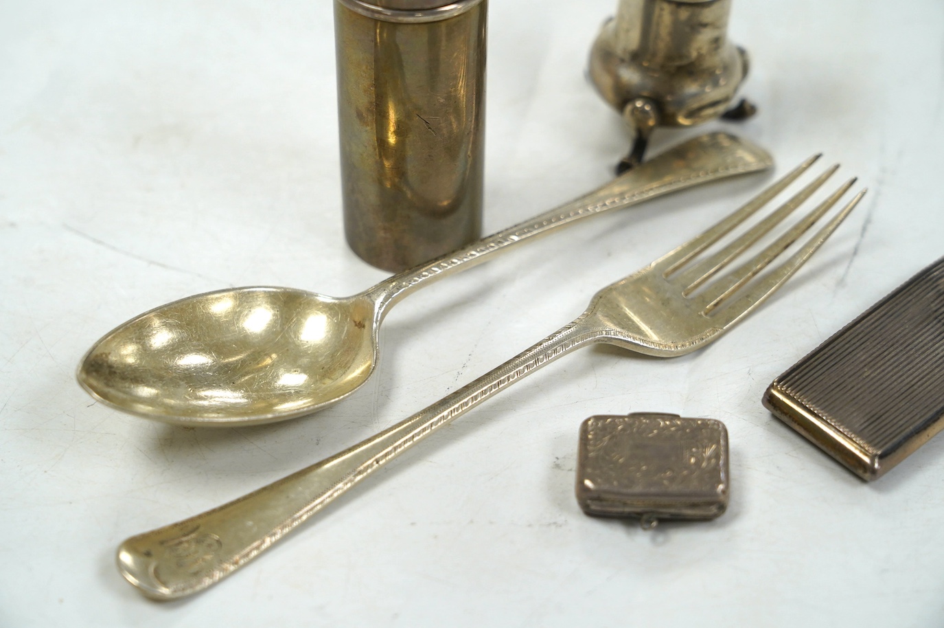 A group of small silver, including a George IV vinaigrette, shaving brush holder, etc. and a Dutch white metal snuff box. Condition - poor to fair